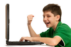 emotional-boy-playing-computer-game-12999429